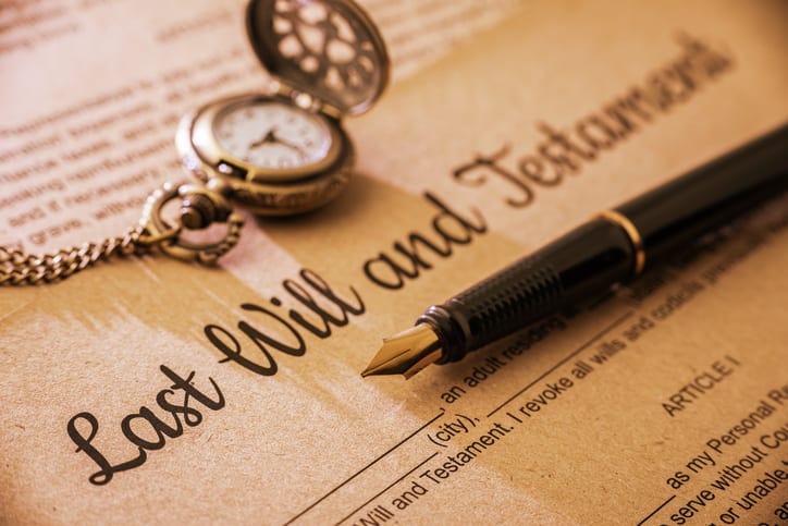 Law Office of Tipton-Downie | Attorney at Law | Vidalia, GA | Fountain pen, pocket watch on a last will and testament.